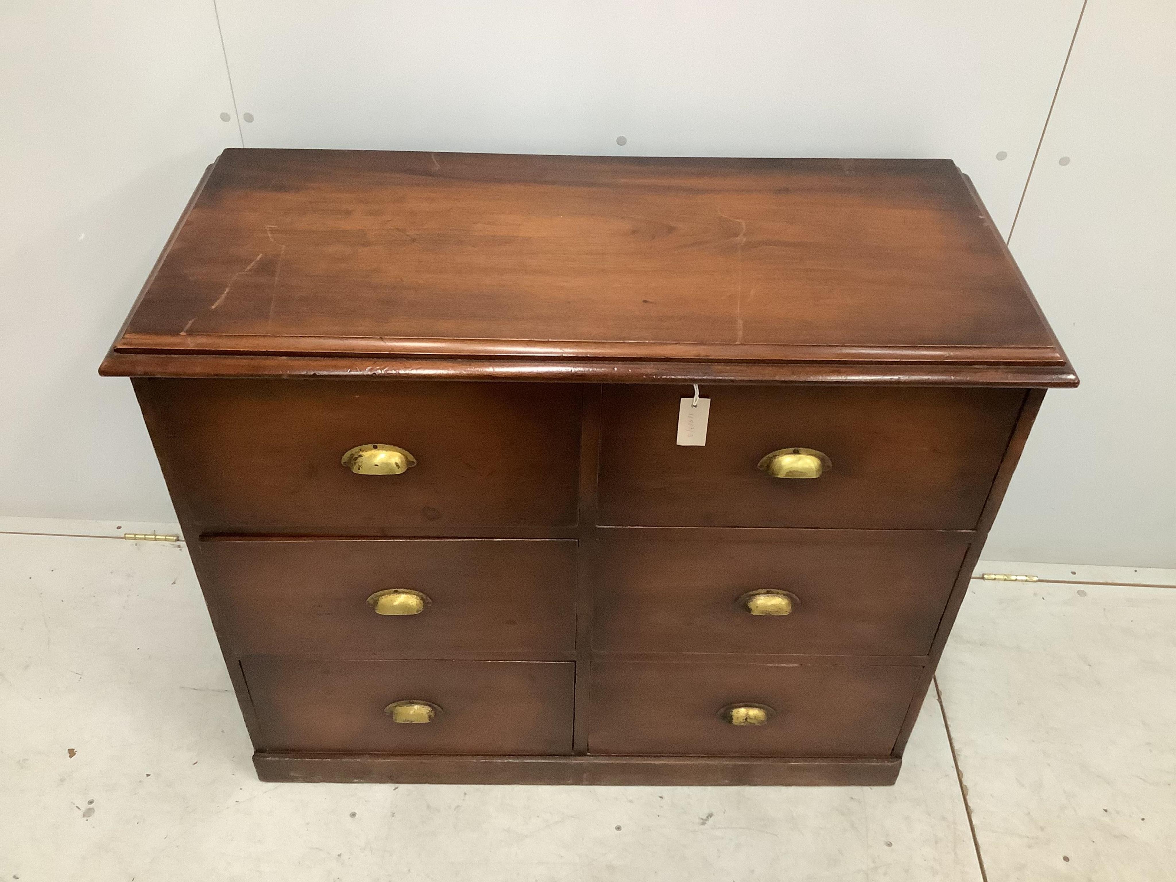 A Victorian and later mahogany six drawer chest with brass cup handles, width 111cm, depth 48cm, height 92cm. Condition - good but top with deep scratches